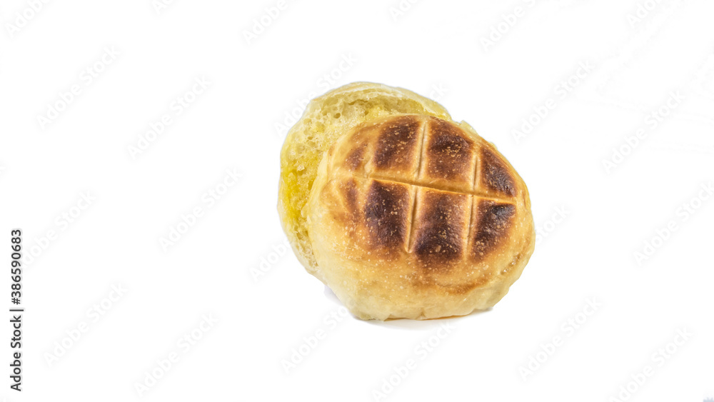 Round bun charcoal grilled serve with crispy bread skin, isolated on the white background. Round bun charcoal grilled serve with crispy bread skin, isolated on the white background.