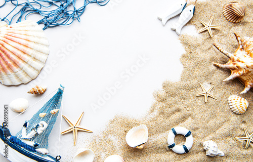 Seashells on sand. Travel concept