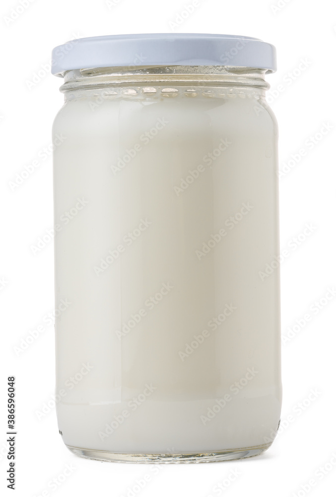Glassware full of fresh milk isolated on white Glassware full of fresh milk isolated on white