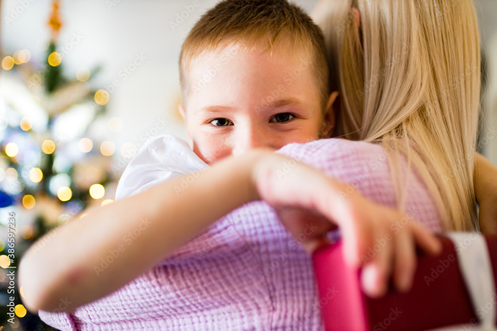 Fototapeta premium young mother and little son, lifestyle holiday people concept self-isolation in quarantine due to coronavirus