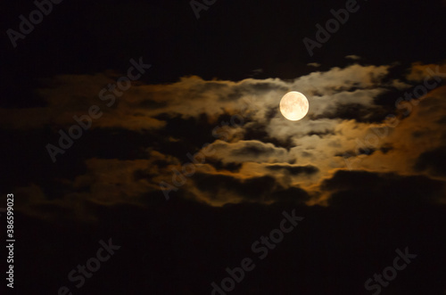 Full moon in the clouds