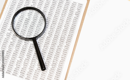 Magnifying Glass and document close up. Business concept