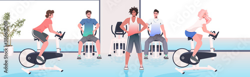 people doing physical exercises on training apparatus fitness workout healthy lifestyle concept modern gym interior full length horizontal vector illustration