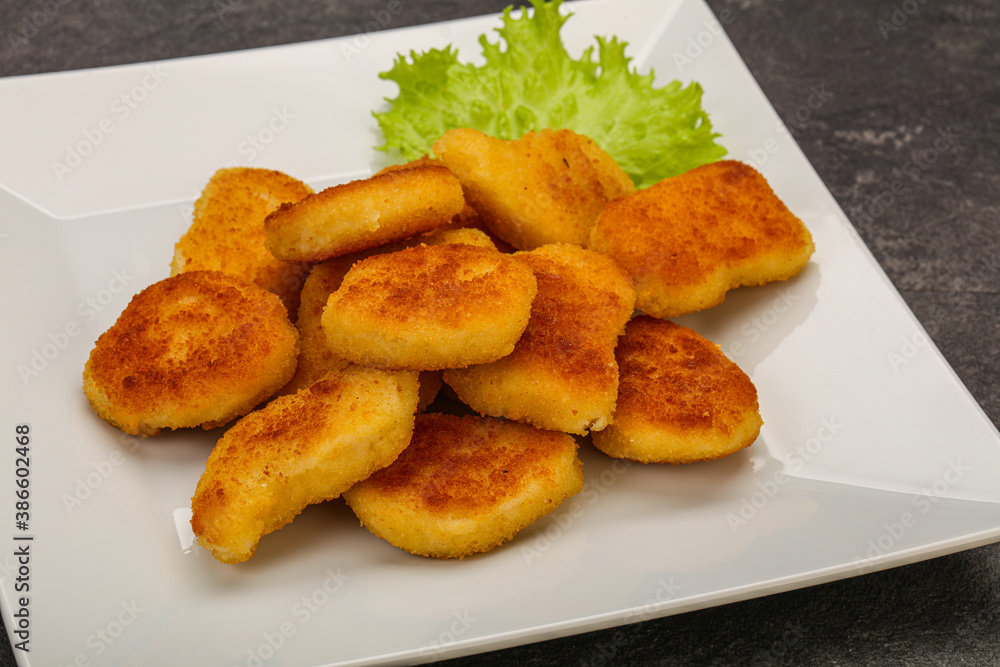 Fried chicken nuggets served salad leaves Fried chicken nuggets served salad leaves