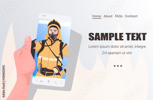 firefighter in uniform on smartphone screen self isolation online communication concept horizontal copy space portrait vector illustration