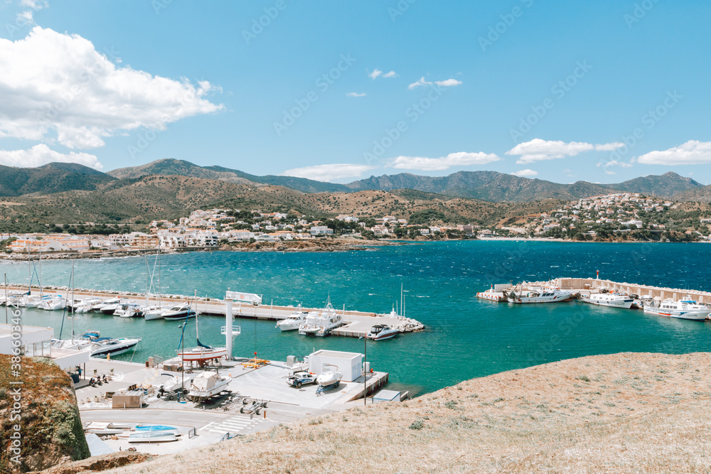 Yachts parking or port with yachts and sailboats, view from above. Mediterranean village with port, panoramic view