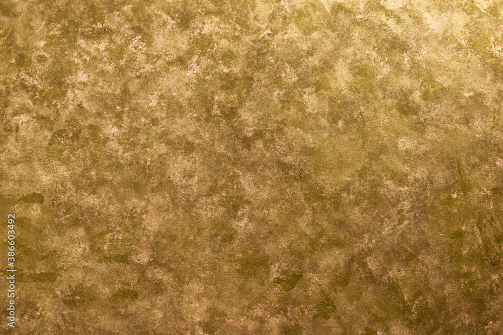 Background of golden paint on canvas. Background of golden paint on canvas.