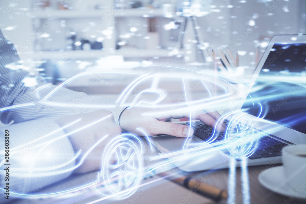 Automobile theme drawing with businessman working on computer on background. Autopilot taxi concept. Multi exposure. Automobile theme drawing with businessman working on computer on background. Autopilot taxi concept. Multi exposure.