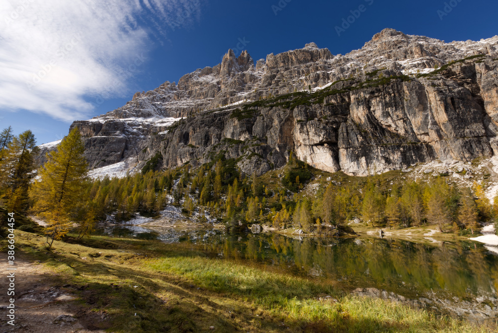 Autumn in the Dolomites, view of Federa lake surrounded by mountains