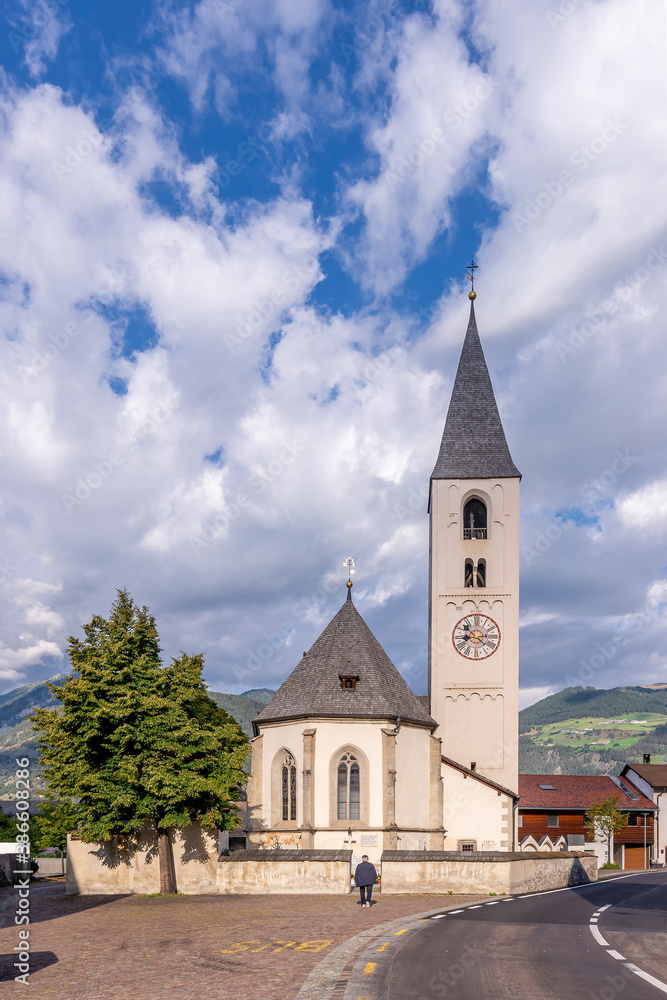 The parish church Pfarrkirche St. Andreas in the old town of Tarces, South Tyrol, Italy