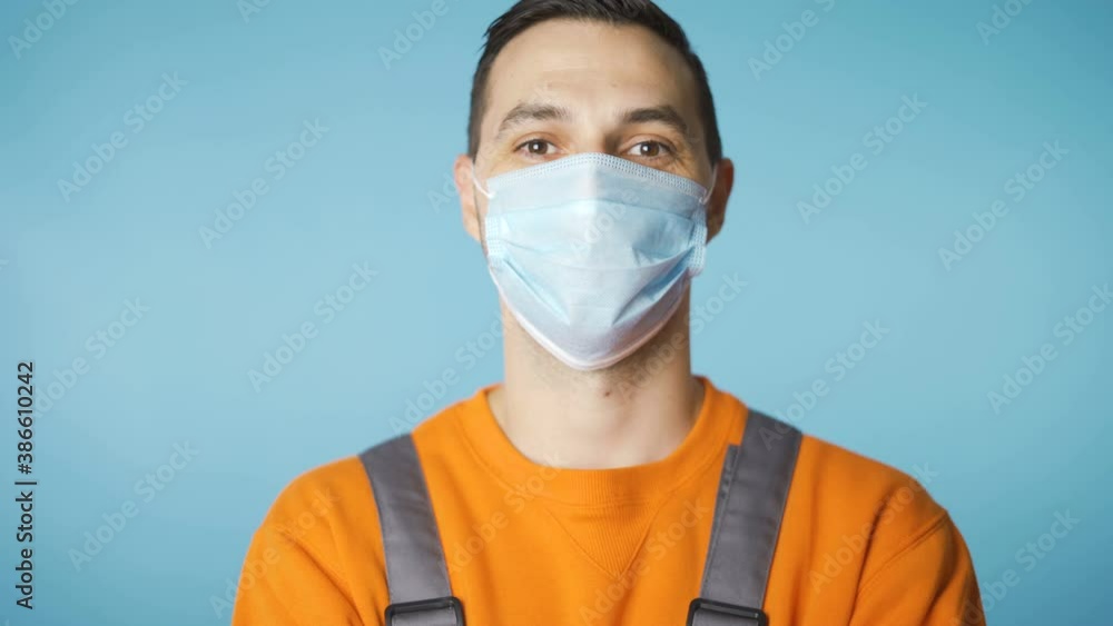 close up portrait of smiling professional worker man face mask covid 19 restriction close up portrait of smiling professional worker man face mask covid 19 restriction