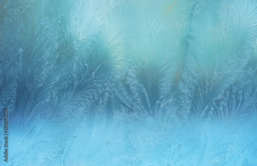 Colorful frosty pattern on the window