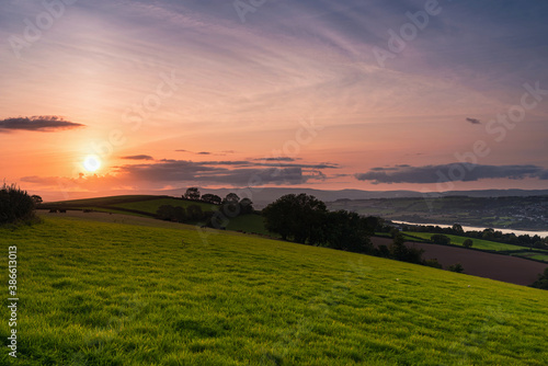 Sunset over the fields in Shaldon in Devon in England in Europe.