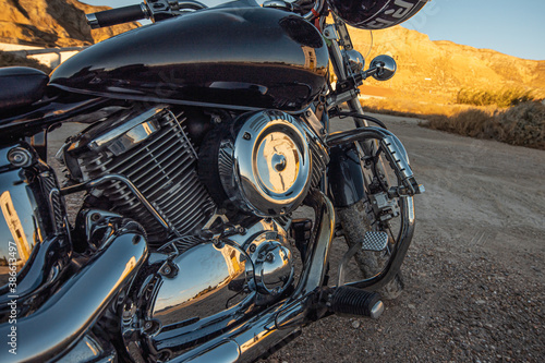 man with black road motorcycle