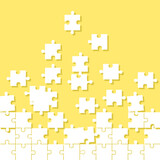 Yellow Jigsaw puzzle pieces background.