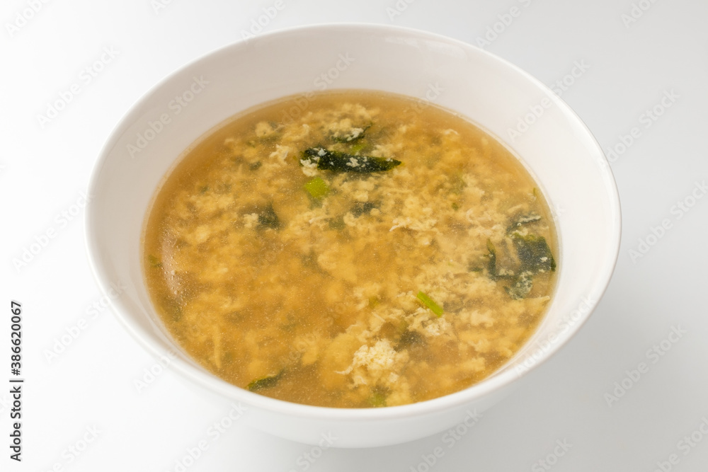 Egg soup on white background