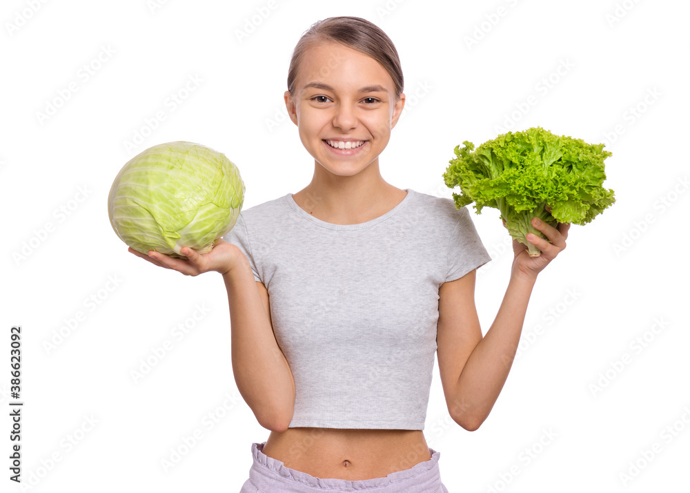 Beautiful young teen girl holding fresh green cabbage, isolated on white background Beautiful young teen girl holding fresh green cabbage, isolated on white background