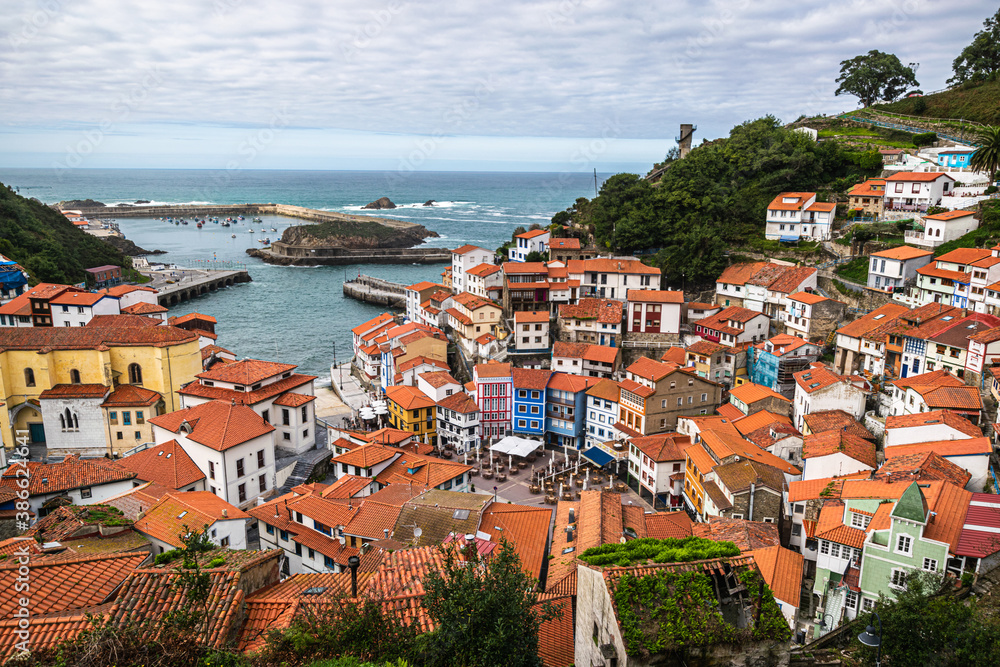 Old fishing village of Cudillero at the Cantabrian Sea coast in Asturias, Spain. Wide angle panoramic view of a picturesque fishing village.