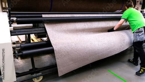 Modern carpet for textile design. The concept of industrial technology. Production automation. Textured background. photo