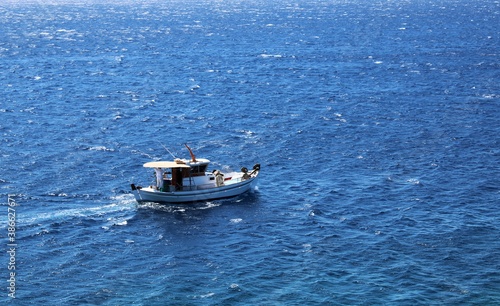 Boat in the sea © Olga