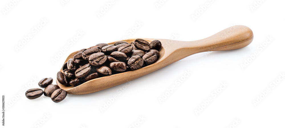 coffee beans in spoon isolated in white background. coffee beans in spoon isolated in white background.