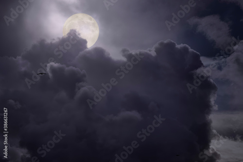 Overcast full moon night