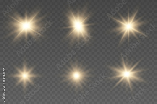 Shining star, the sun particles and sparks. Light effect, golden glowing flash with gold rays and lights.