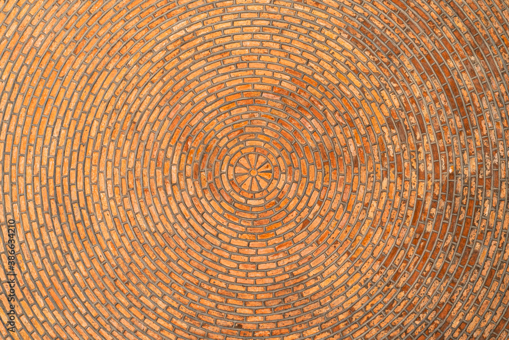 Fototapeta premium Red brick vault. Ceiling. Circular pattern. Architectural texture