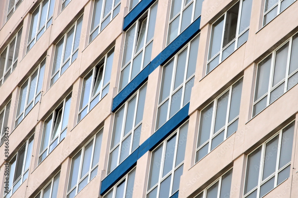 new windows on the facade of a high-rise building