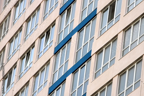 new windows on the facade of a high-rise building