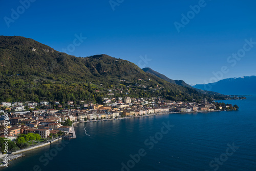 Panoramic view of the historic part of Salò on Lake Garda Italy. Aerial view of the town on Lake Garda. Tourist site on Lake Garda. Lake in the mountains of Italy.