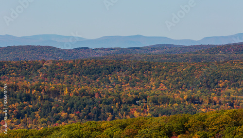 Colorful Autumn vistas of mountains and valleys. Yellow, orange and red leaves glisten in the sunshine- 1 © rjzeytoonian