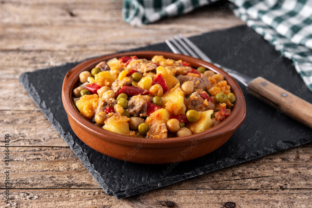 Ropa vieja food in bowl on rustic wooden table Ropa vieja food in bowl on rustic wooden table