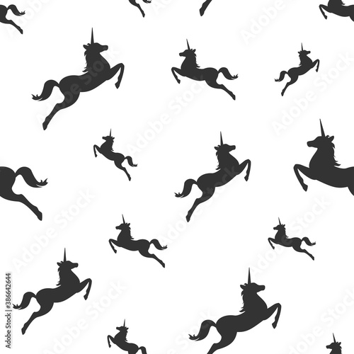 seamless fantasy pattern with unicorns. vector flat illustration.
