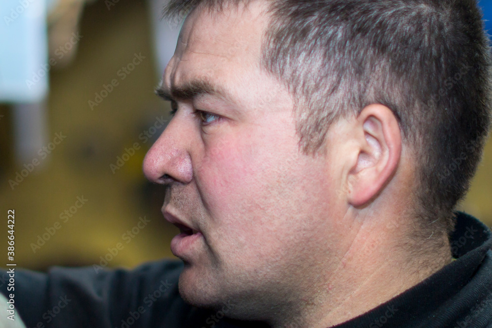 Fototapeta premium Close-up portrait of a man in the workplace