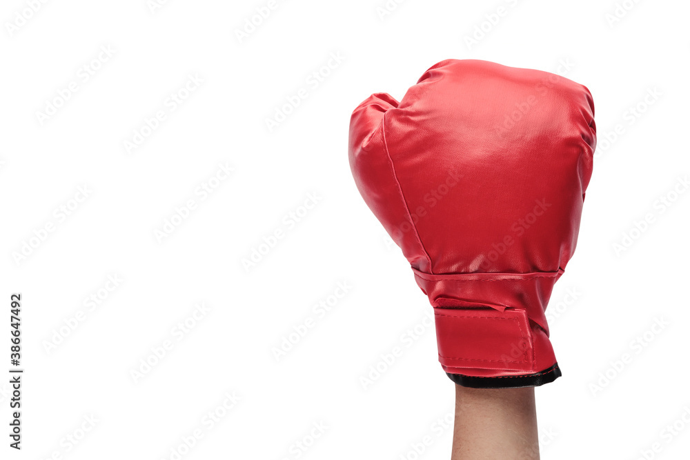 Raised arm with closed fist with a red boxing glove isolated on a white background and copy space