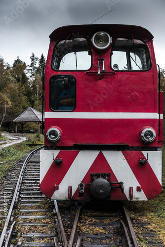 Old Retro Red Locomotive in Bieszczady Mountains in Poland. Vintage Train Tourist Attraction