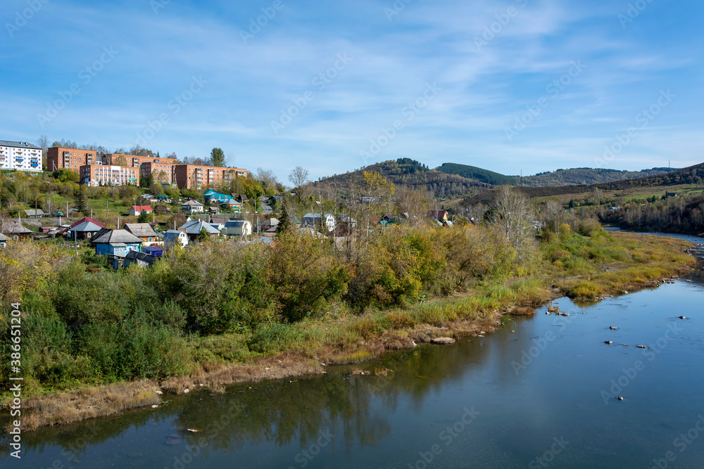 View of the Telbes river in the village of Mundybash, Gornaya Shoria