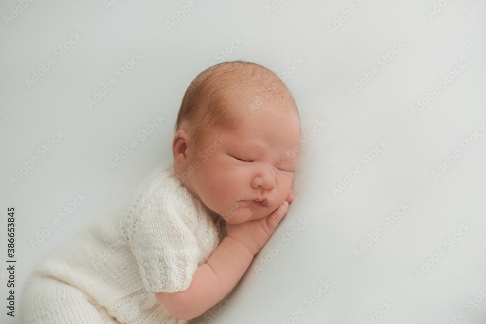 portrait of a little infant newborn baby: baby's face close-up. concept of childhood, healthcare, IVF
portrait of a little infant newborn baby: baby's face close-up. concept of childhood, healthcare, IVF