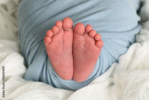 Newborn Baby's feet. newborn baby legs,legs massage
