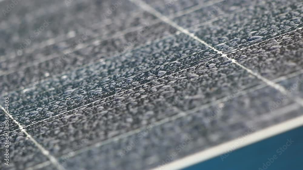 Raindrops that flow on the solar panel with waterproof ,Full HD,video,1980x1080 Raindrops that flow on the solar panel with waterproof ,Full HD,video,1980x1080