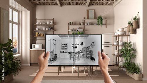 Hands holding notepad with country kitchen design blueprint sketch or drawing. Real interior design project background. Before and after concept, architect designer work flow idea