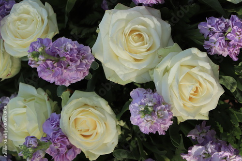 White and purple wedding centerpiece