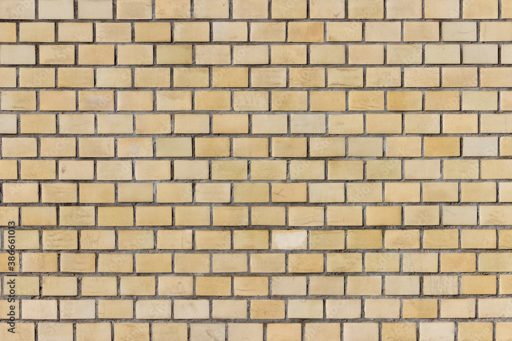 Surface of a yellow brick wall. Surface of a yellow brick wall.
