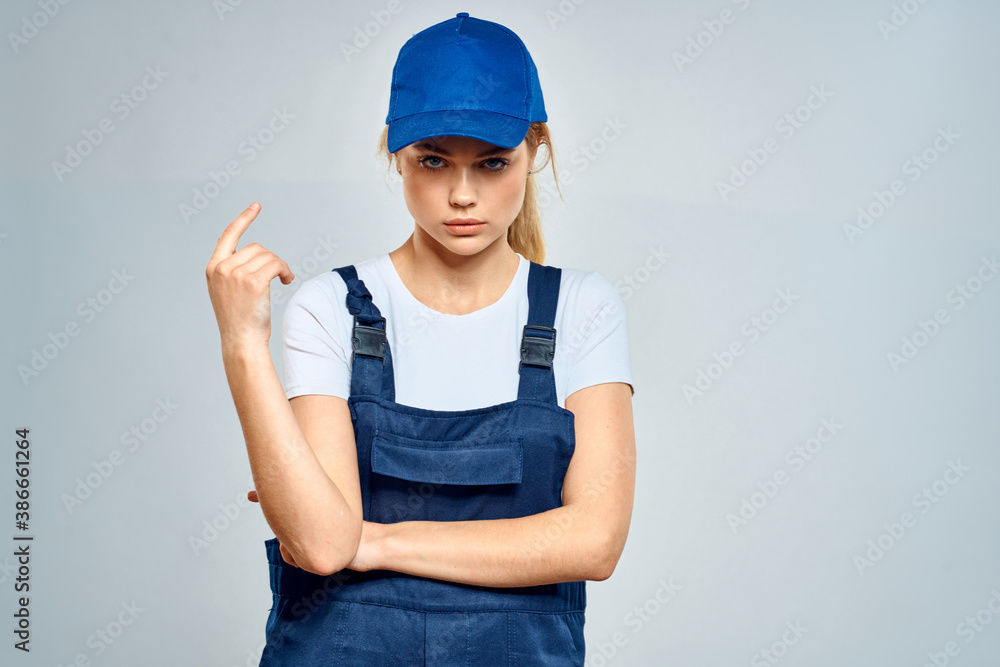 Working woman in uniform courier delivery service lifestyle Working woman in uniform courier delivery service lifestyle
