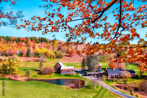Idyllic New England rural farm and landscape with colorful autumn foliage. 
