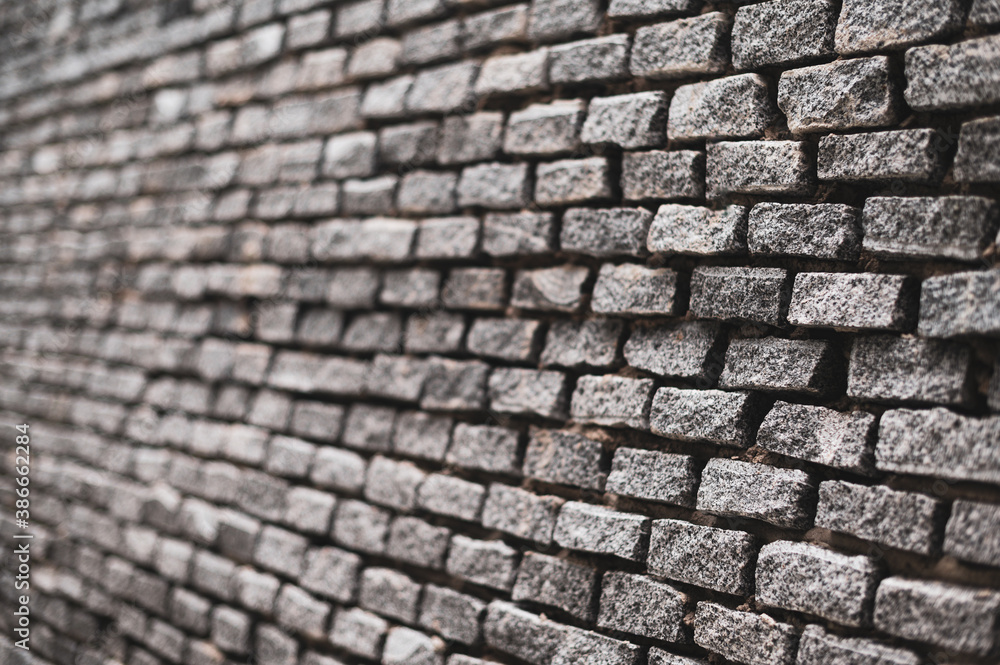 Shallow depth of field with Old vintage  brick wall. Abstract architectural loft background for design.