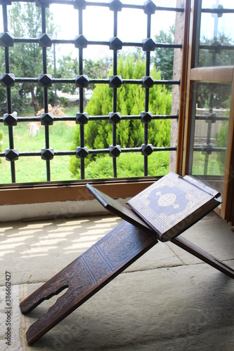 Quran in front of the window in Mosque
