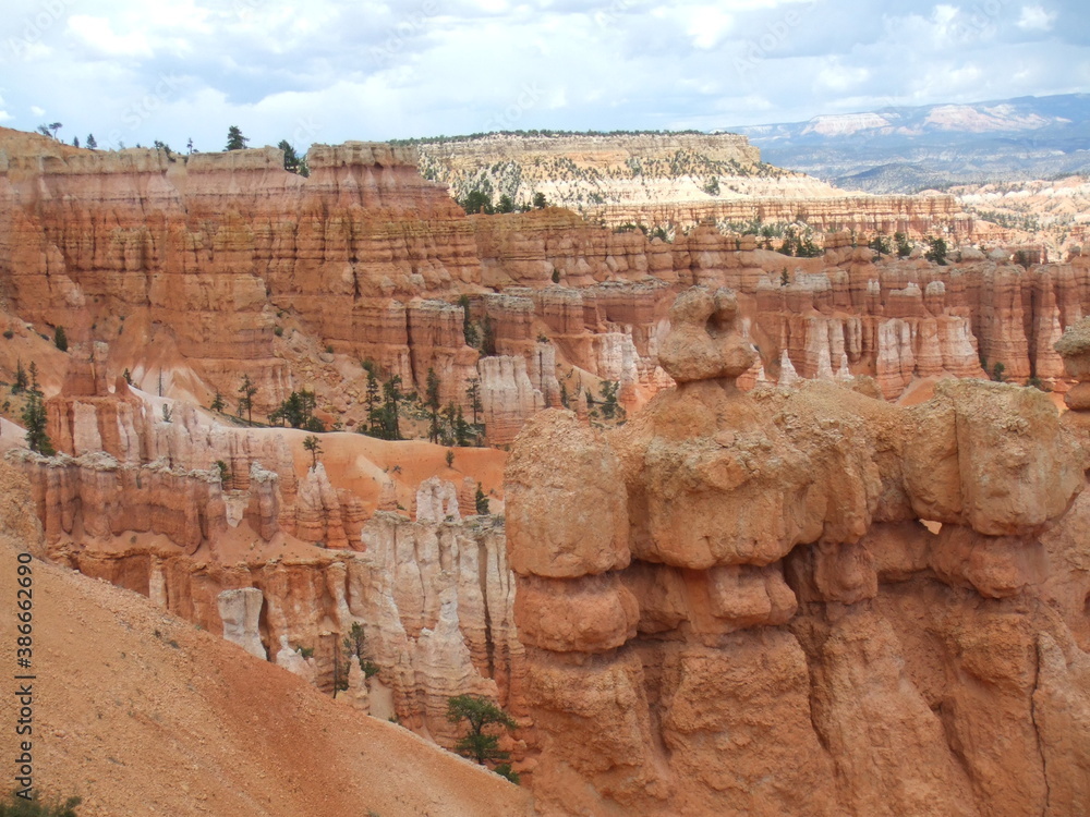 Stunning Bryce Canyon, Utah, USA. Spectacular bright orange rock formations, created by natural erosion. Stunning Bryce Canyon, Utah, USA. Spectacular bright orange rock formations, created by natural erosion.
