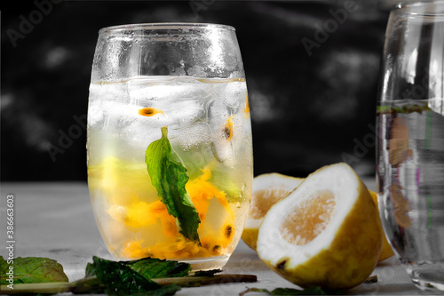 iced passion fruit soda with mint leaves photo